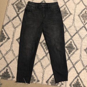 Girlfriend style black jeans, with distressed hem
